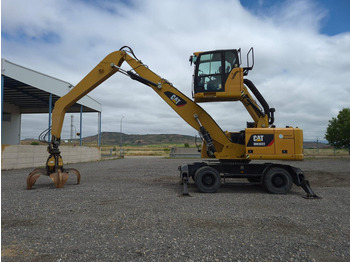 Bager na kolesih CATERPILLAR MH3022