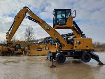 Bager na kolesih CATERPILLAR MH3024