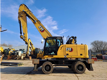 Bager na kolesih CATERPILLAR MH3024