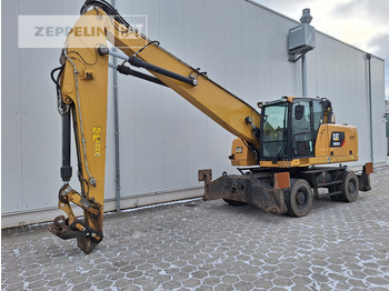 Bager za prekladanje primarnih/ Sekundarnih surovin CATERPILLAR MH3024