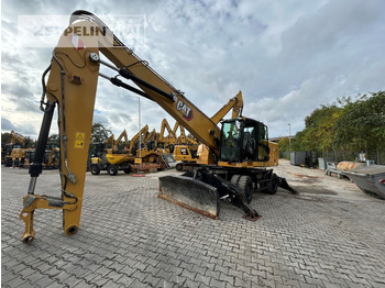 Bager za prekladanje primarnih/ Sekundarnih surovin CATERPILLAR MH3024